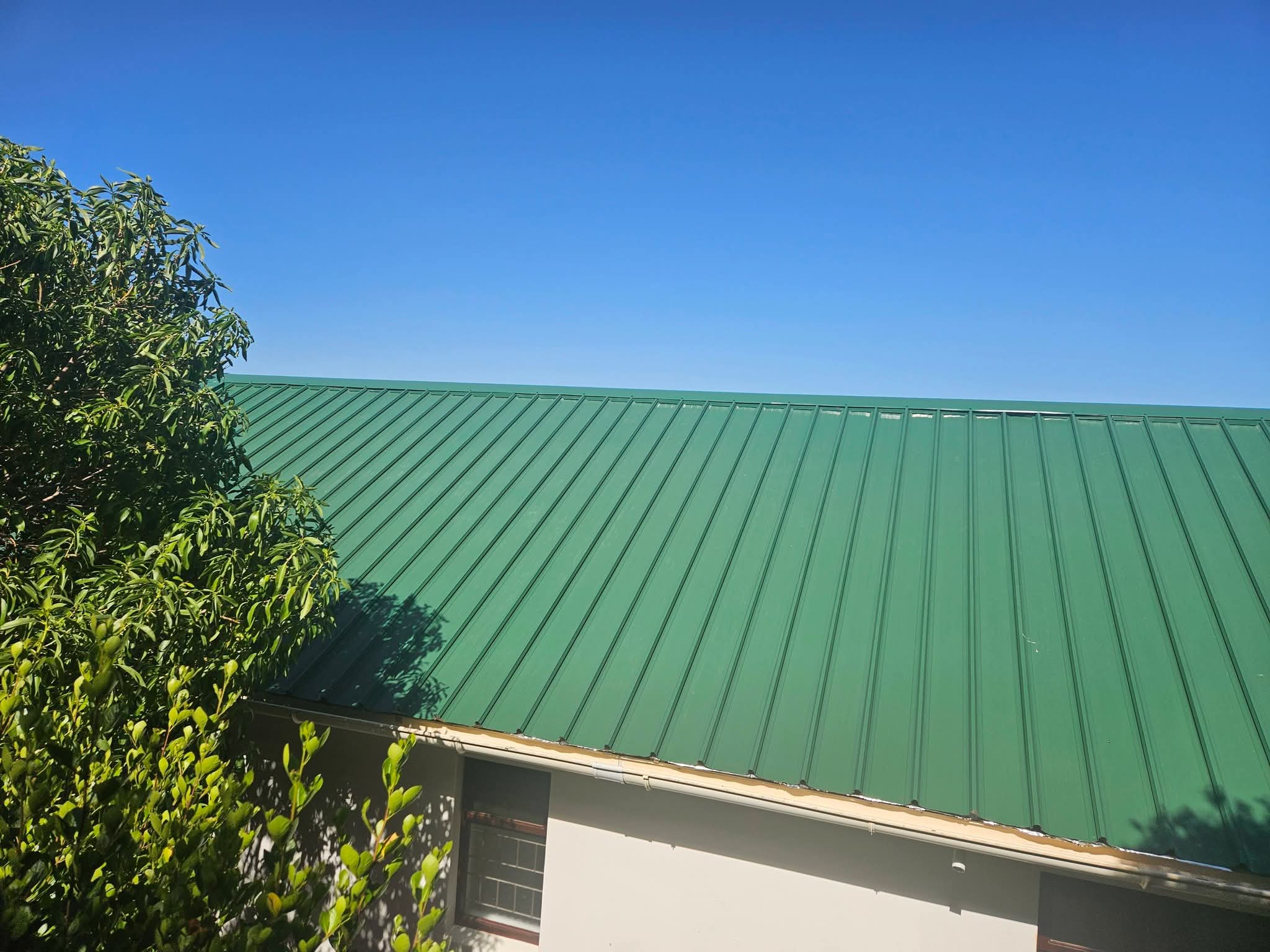 Completed green standing seam roof